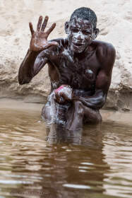 men washing in Luanginga river | men washing in Luanginga river | Liuwa Plain NP, Northwest, ZM - Nov 2012 © paulgodard.com men washing in Luanginga river