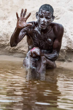 men washing in Luanginga river | men washing in Luanginga river | Liuwa Plain NP, Northwest, ZM - Nov 2012 © paulgodard.com men washing in Luanginga river