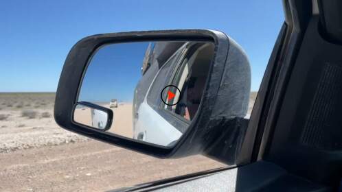 camping cars driving on gravel road