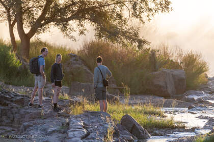 Jojo, Julien & Simon near river at sunrise