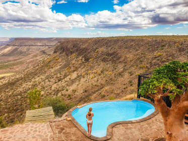 woman next to swimming pool