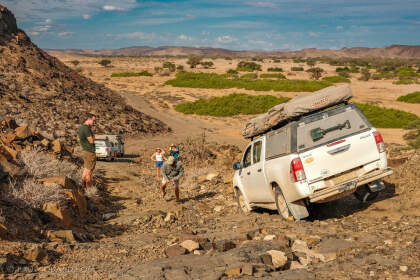 Marie, Manon, Mathou, Paul & Simon takling pictures of camping car driving down rocky slope