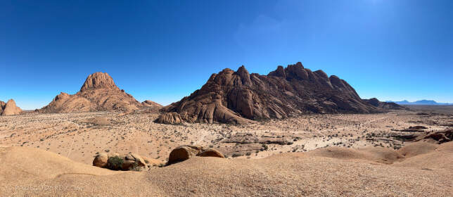 pano - massive granite hills in plain