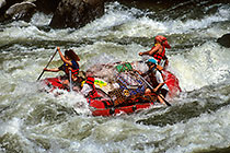 People in boat in rapids on Salmon river during rafting trip