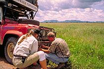 Paul & Kim repairing winch on landy(F)