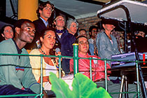 sound engineer, Petra speaking & Paul sitting during show