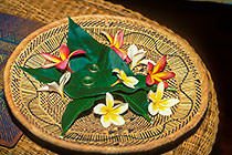 rings in basket w coral tree flowers & leaves