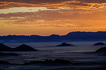 dunes at sunset + clouds