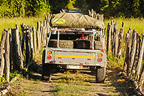 Land Cruiser with trailer crossing bridge