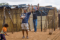 bushman people happy because of rain storm