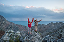 Enya & James on top of rocky mountain + False bay