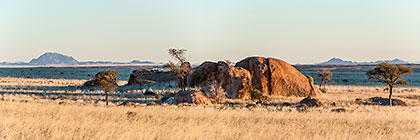 outcrop in grass plain