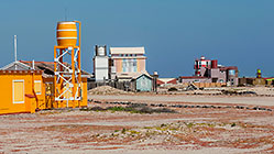 houses w water tank along beach