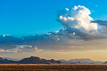 desert plain & mountains | clouds at sunset