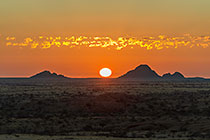 desert plain & moutains at sunset