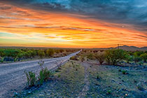 road & clouds at sunset