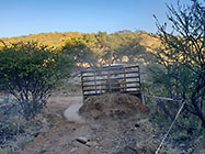 bulldozer making access road to plot