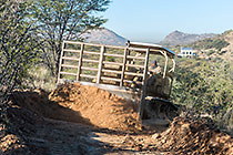 bulldozer making access road to plot