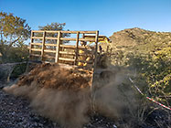 bulldozer making access road to plot