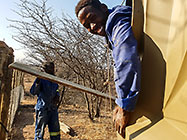 Rodney & Sedney moving 10000 l over fence