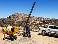 workers erecting columns of workshop steel portal
