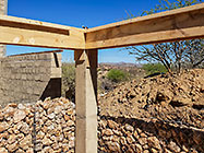 wooden boxes for concrete ring above gabion room