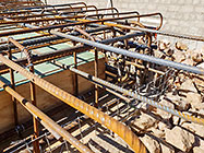 steel bars on studio suspended slab over gabion room