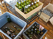 glass bottles waiting to be cut