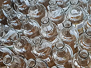 glass bottles waiting to be cut