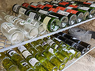 glass bottles waiting to be cut