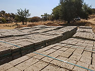 building material in river bed : bricks