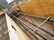 Licius workers bricklaying workshop walls