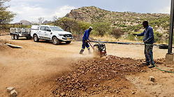 Donald & Sedney compacting area in fron of workshop
