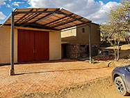 brick paved area in front of workshop
