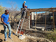 Licius workers bricklaying studio walls