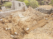 excavated trenches & house office walls