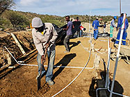 Bernard workers levelling house floors
