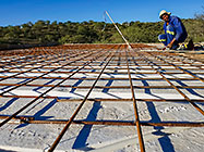 Donald tiding steel bars over styroblocks for house office ceiling slab