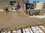 Bernard workers levelling house concrete floor