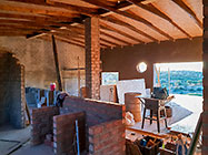 house kitchen island brick walls