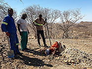 installing internet 12 m tower on top of hill with 4x4 truck & farm workers