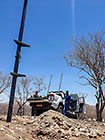 technician connecting antenae on 12 m internet tower