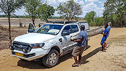 loading 4 m mokoro on ranger