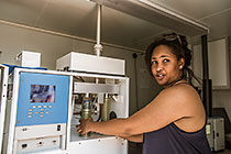 environmental scientist checking air analyser in Tsumeb environmental station for air pollution
