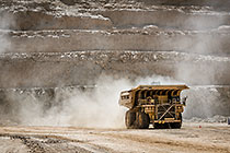 320 T truck driving in pit