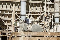 team replacing core roll inside mill