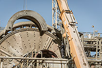 team & crane replacing core roll inside mill