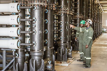 workers checking filter units in ultra filtration building