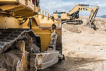 bulldozer & excavator working on diamondiferous field