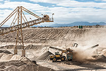 loader dumping diamondiferous gravel for separation